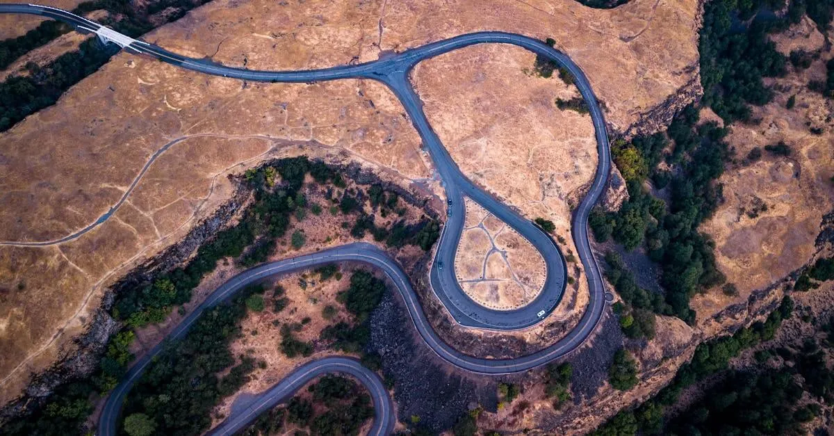 Stunning aerial view of a winding road in Mosier, Oregon, showcasing the landscape's natural beauty.