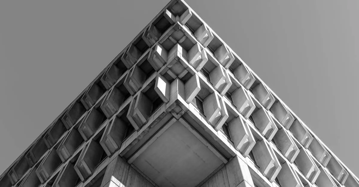Minimalist black and white low angle view of Brutalist architecture in Boston.