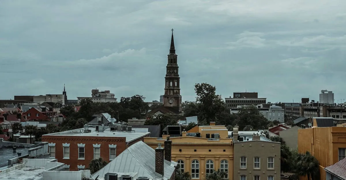 A picturesque view of Charleston, SC, featuring a historic church tower amidst vibrant buildings.