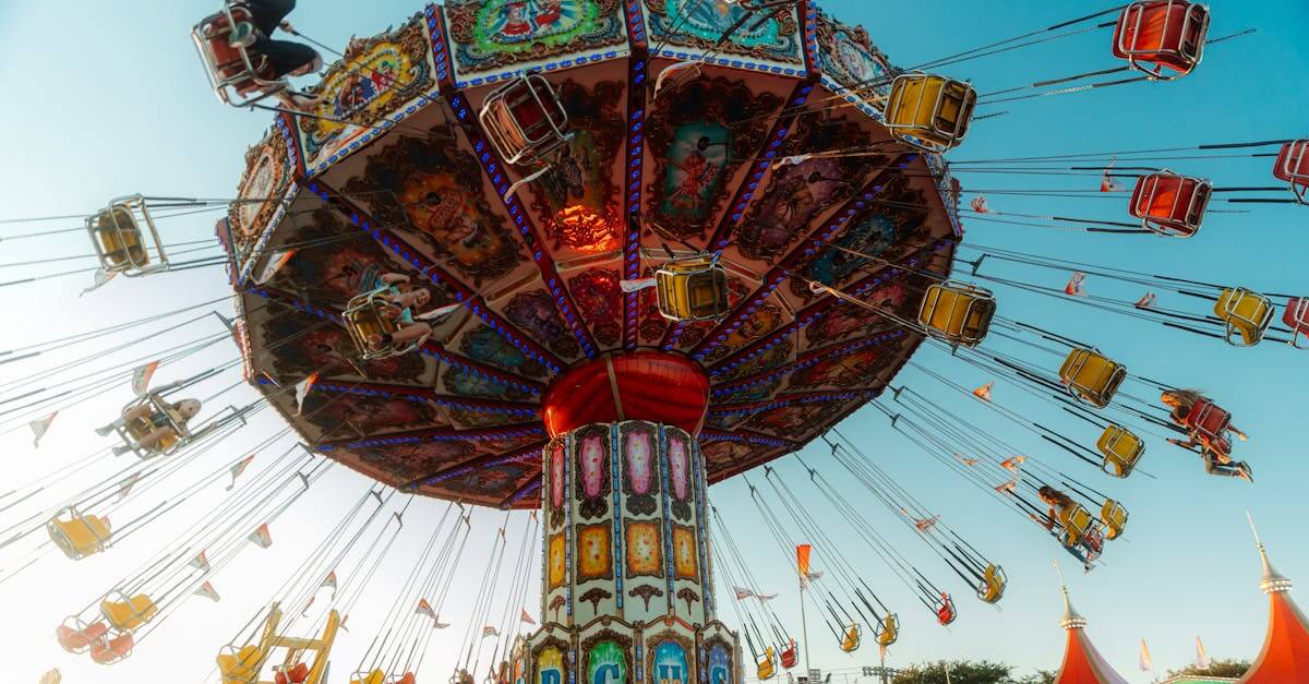 Colorful swing ride spinning at an amusement park in Costa Mesa, California.