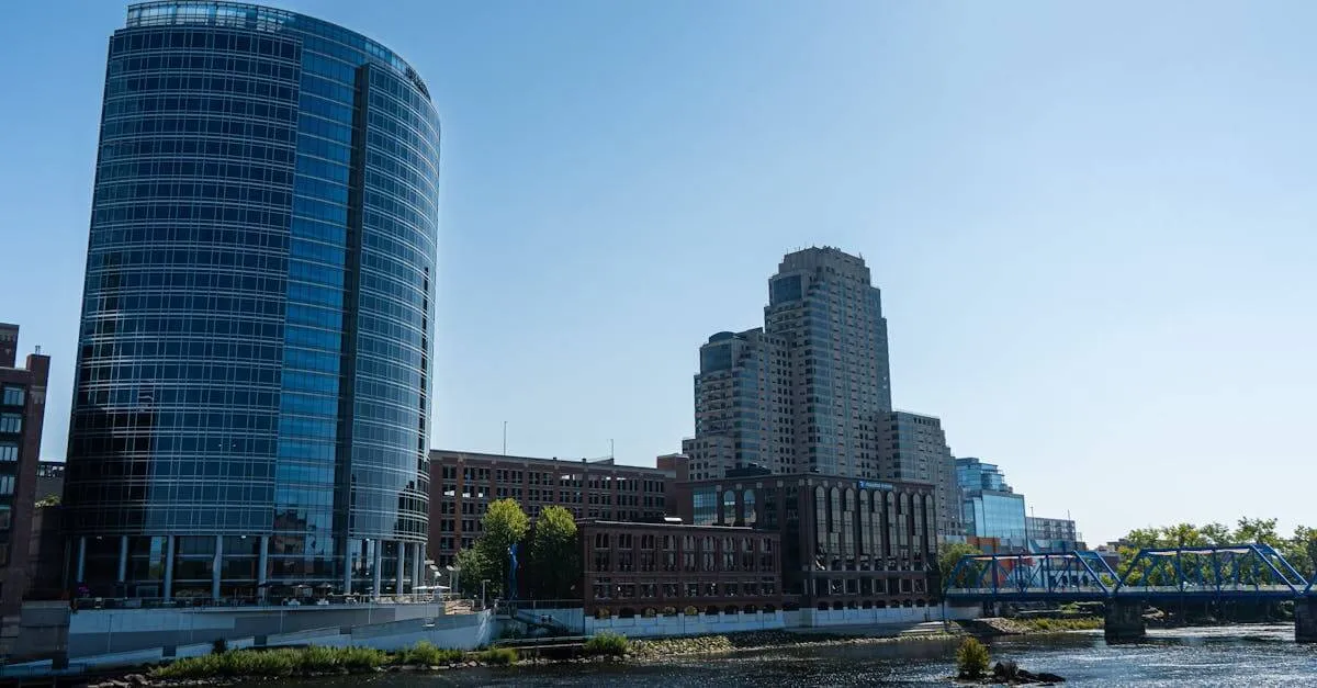 Scenic view of Grand Rapids skyline featuring the iconic Blue Bridge and modern architecture by the Grand River in Michigan.
