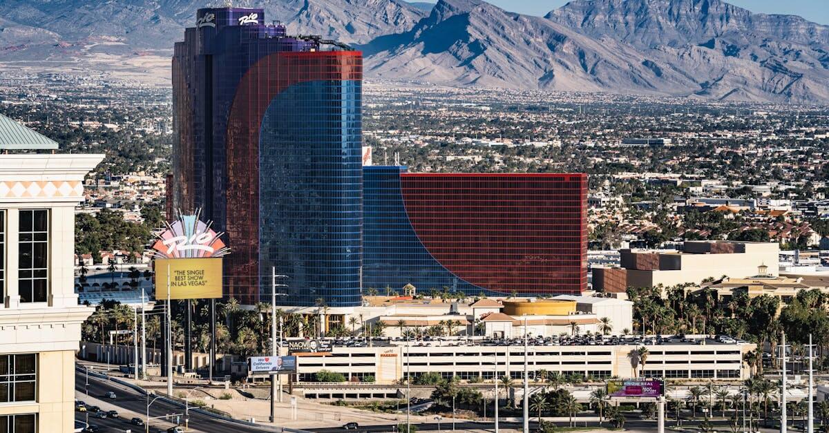 A breathtaking shot of the Rio Hotel and Casino set against the Las Vegas skyline and mountains.