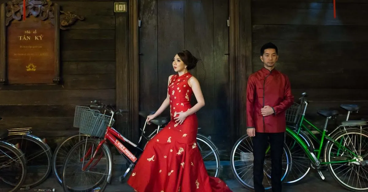 Stylish Vietnamese couple posing in traditional attire in Hoi An with vintage bicycles.