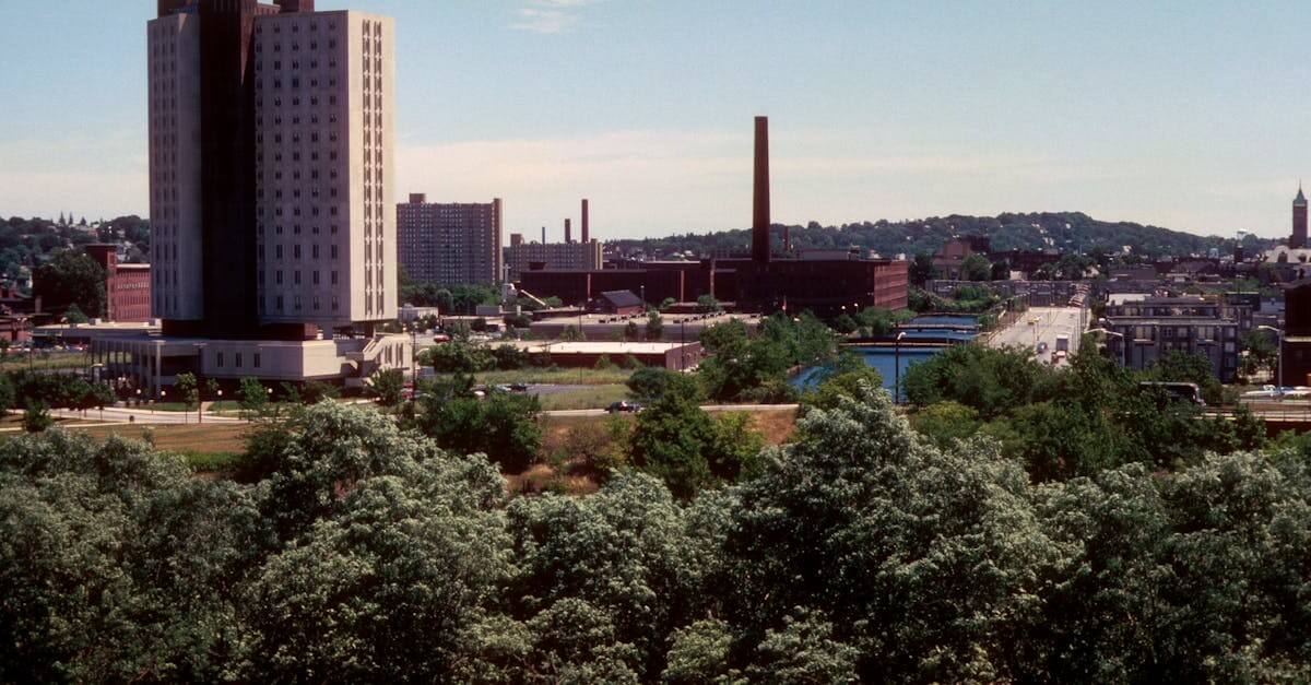 Skyline of Lowell, Massachusetts with prominent buildings and smokestacks.