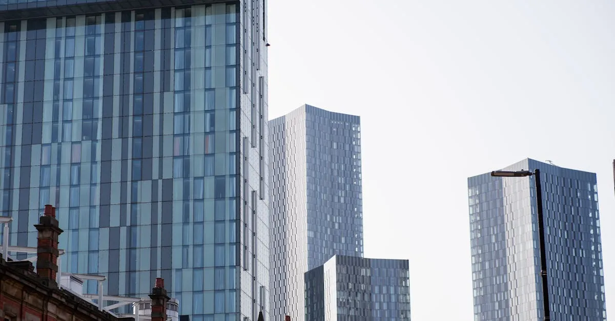 A view of modern skyscrapers in Manchester, showcasing urban architecture and city life.