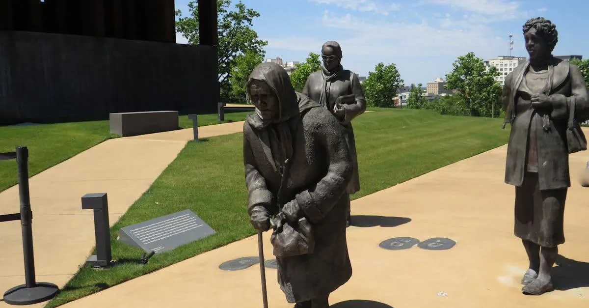 Statues at a memorial park in Montgomery, AL, honoring historical figures.