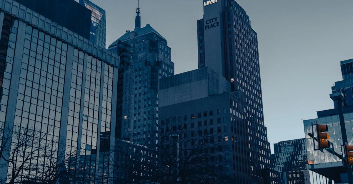 Low-angle view of Oklahoma City skyscrapers at dusk, showcasing modern urban architecture.