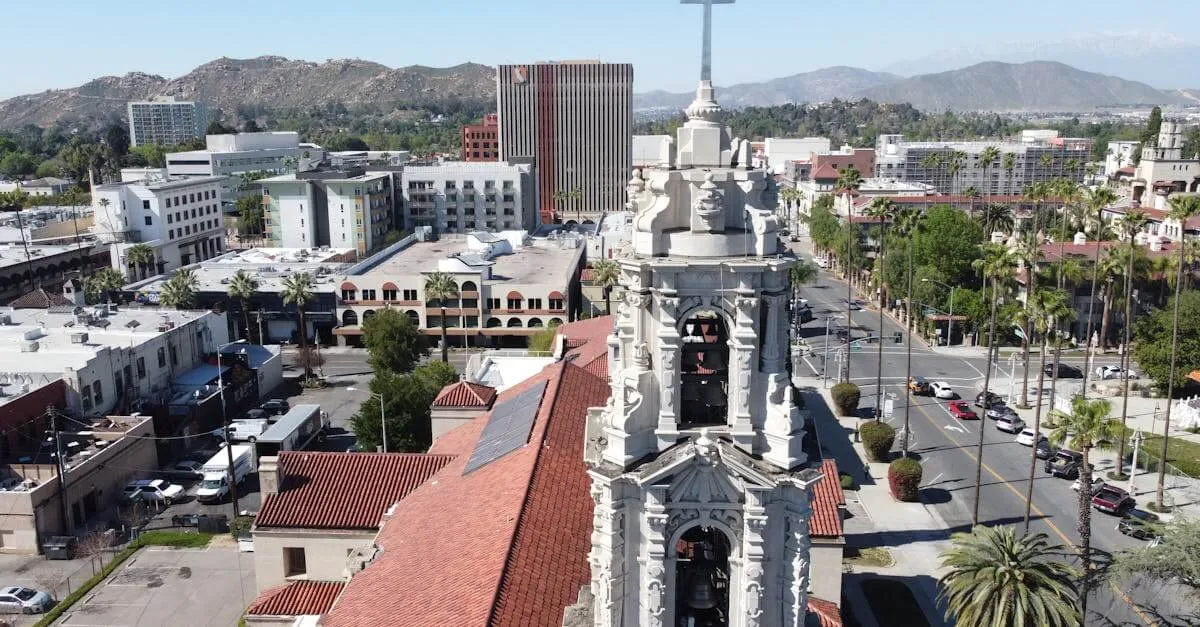 Explore a stunning aerial shot of Downtown Riverside, CA, featuring a historic cathedral.