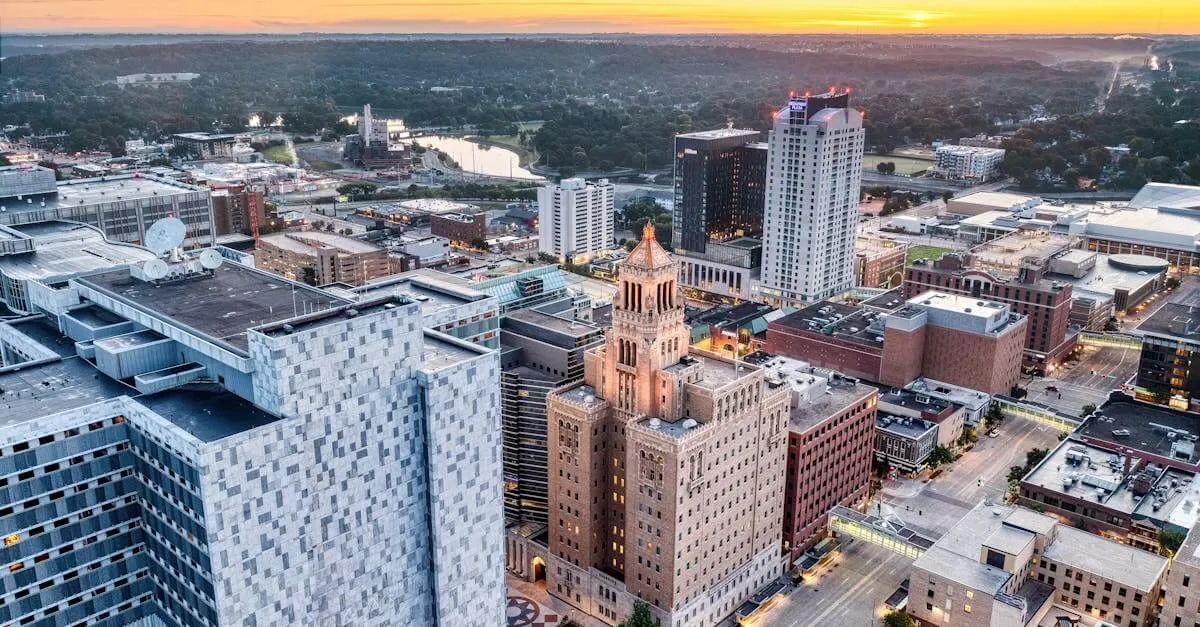 Breathtaking aerial view of Rochester's cityscape during sunset, highlighting urban architecture.