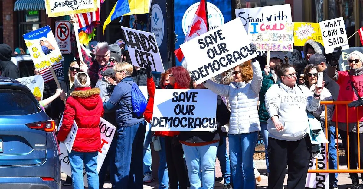 Group of people protesting for democracy in downtown Sioux Falls, holding signs for democratic rights.