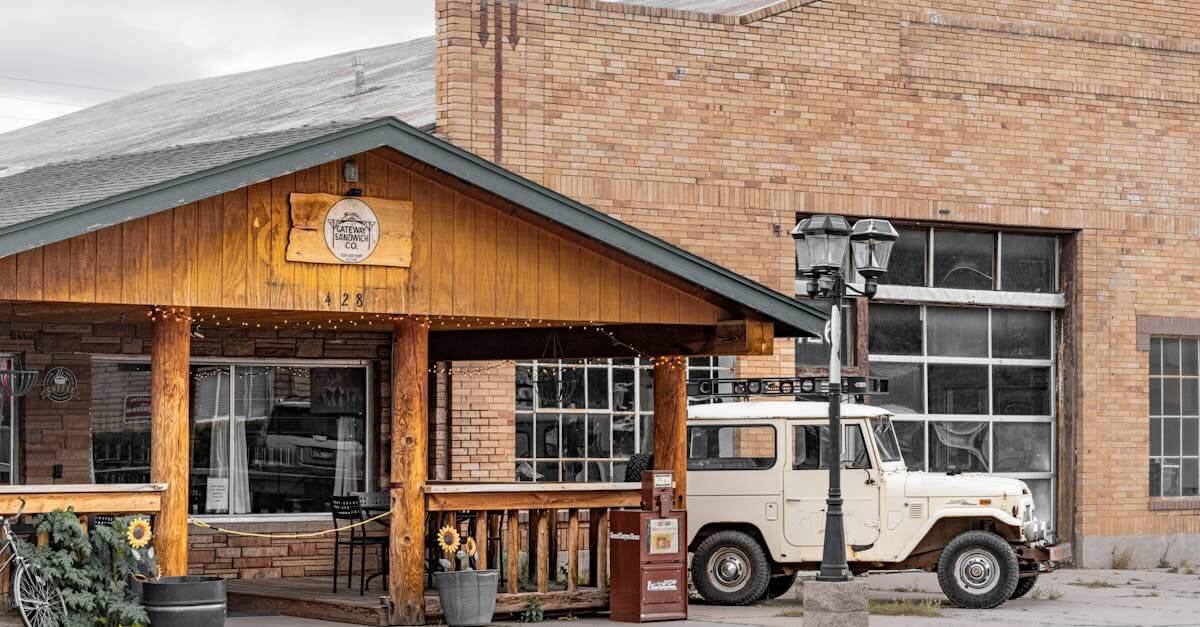 Explore a vintage cafe experience along Route 66 in Williams, Arizona featuring classic decor and a retro vehicle.