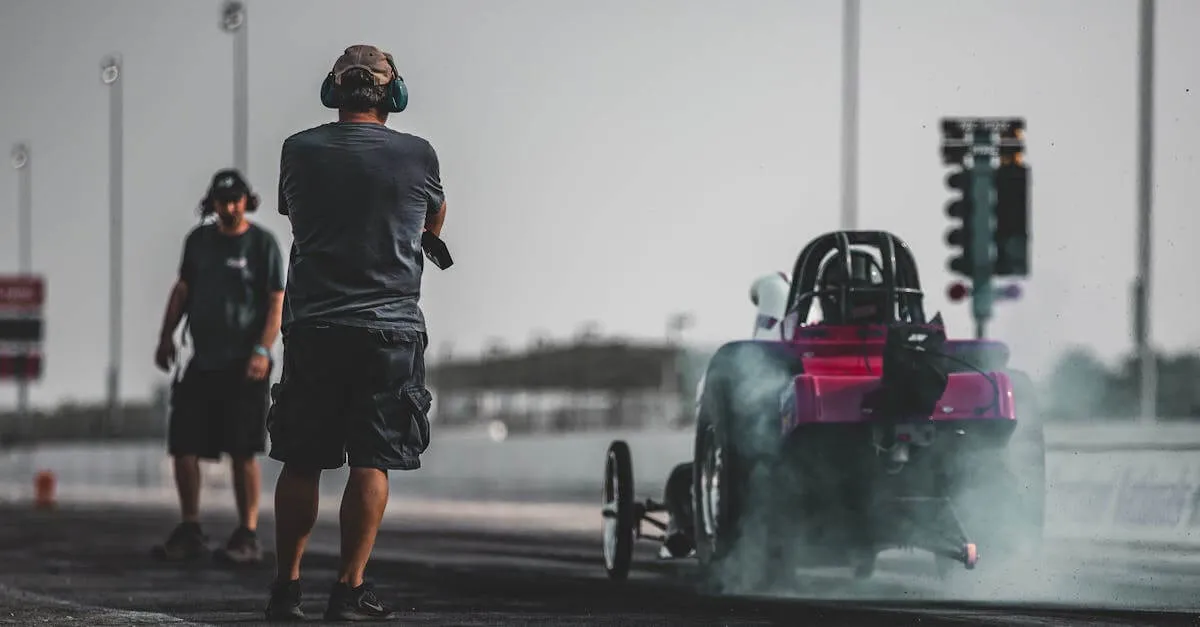 High-speed drag racing action captured on a sunny day at Topeka Raceway.
